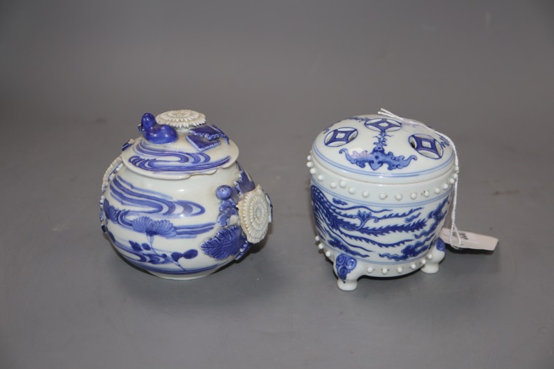 Two Chinese blue and white dragon jars and covers